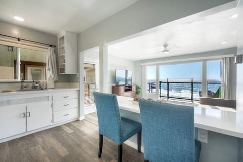 Dining area with ocean views and breakfast bar