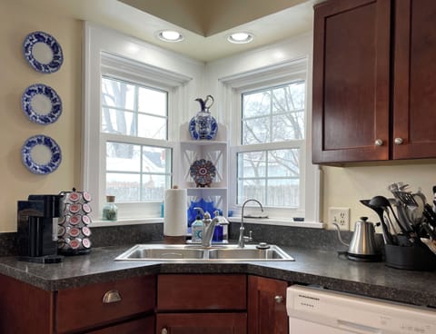 Start your morning your way in this bright, charming kitchen ☕🌞 — sunlit windows, thoughtful details, and everything you need to make your retreat feel just like home.