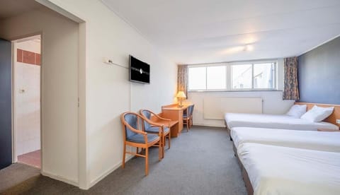 Settle in after exploring with comfy seating and TV.
