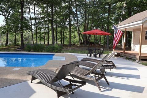 Sit and visit for a good time, gathered around our saltwater pool