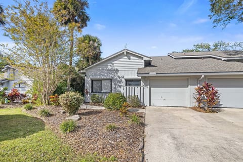 Bright and inviting beach stay featuring tropical landscaping, private garage, and a peaceful coastal vibe. Perfect for a relaxing seaside getaway, this charming vacation home offers comfort and convenience just minutes from the beach.