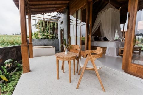 Suite, Balcony, Garden View | Terrace/patio