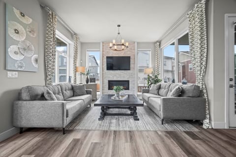 Spacious living room perfect for relaxing and gathering together.