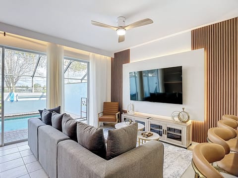 Fully renovated living space designed to Recharge. 

Clean lines, calm tones, an immersive 75” Smart TV with Roku and Google TV. Sliding doors open directly to the pool.