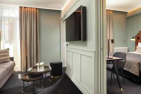 Junior Suite, 1 Bedroom | Minibar, in-room safe, individually decorated, desk