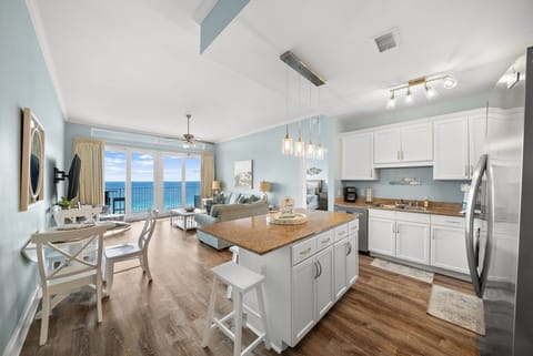 Your open-concept haven features a stunning oceanfront kitchen and living space where you'll cook with endless sea views as your backdrop.