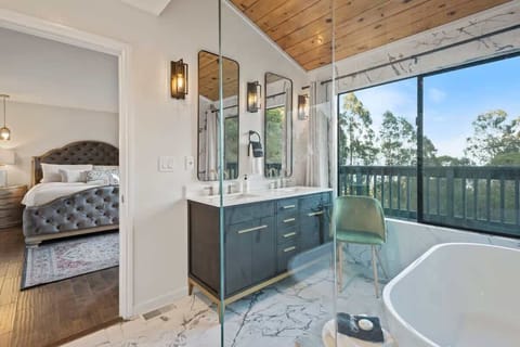 Comfortable master bedroom featuring a modern en-suite
