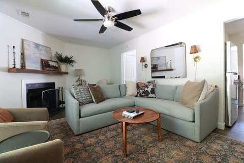 Cozy living room with a large sectional + 65” TV
