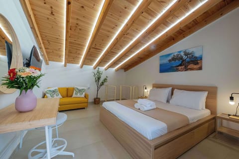 Loft Bedroom with Wooden Ceiling and Double Bed
