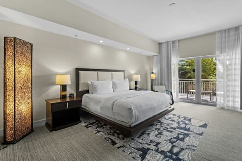 Comfortable bedroom retreat featuring modern décor and a calm setting ideal for restful nights.