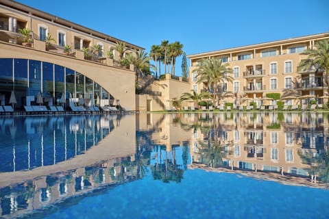 Indoor pool, outdoor pool, pool umbrellas, sun loungers