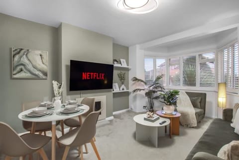 Living Room: Relax and binge your favorites on Netflix in a stylish, bright space!