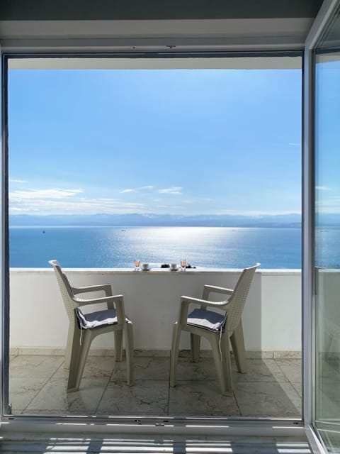 Standard Apartment, Multiple Beds, Balcony, Sea View | Premium bedding, minibar, desk, laptop workspace