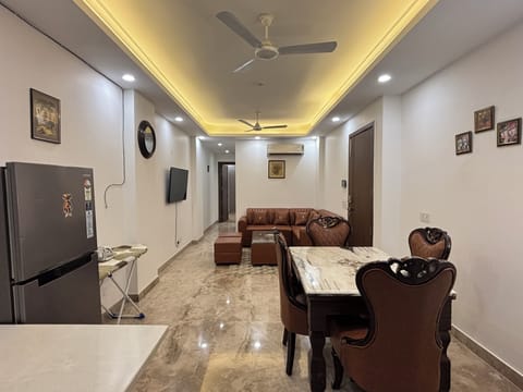 Apartment, Balcony, City View | Living area | Smart TV