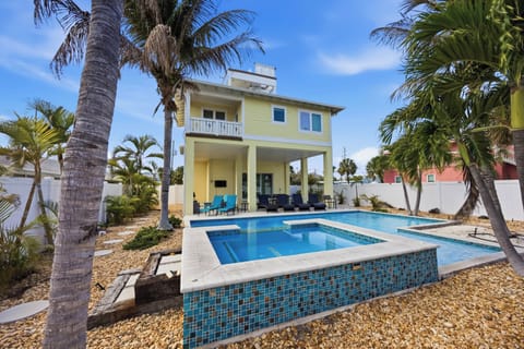 Tropical paradise awaits with your private pool surrounded by swaying palms and island charm.