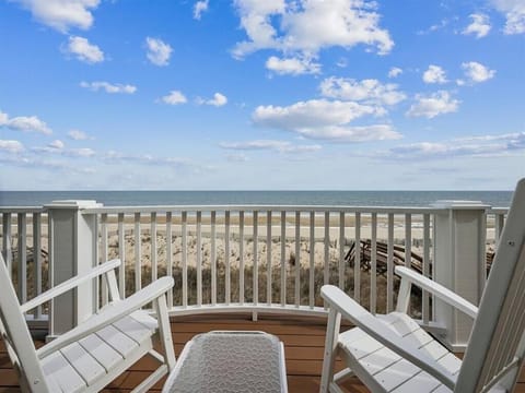 A close-up of the inviting deck chairs, ideal for enjoying the ocean breeze and stunning sunsets.