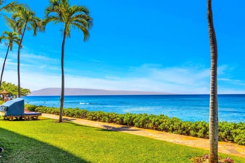 Stunning panoramic ocean views framed by swaying palms set the tone for your Hawaiian paradise KS-104