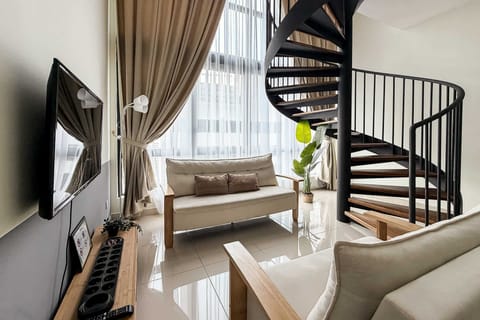 A modern duplex with a spiral staircase.