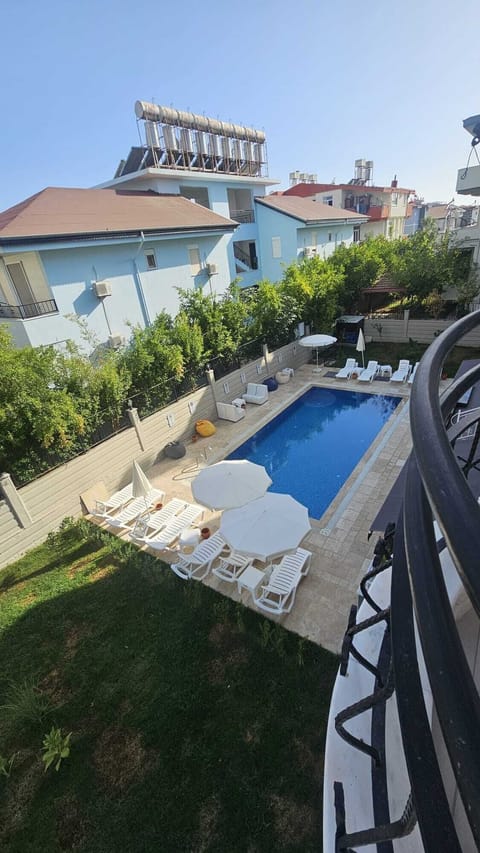 Family Condo, Balcony, Pool View | Pool | Seasonal outdoor pool, pool umbrellas, sun loungers
