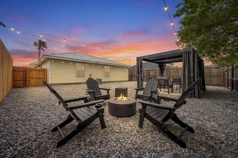 Enjoy a beautifully landscaped backyard oasis, perfect for unwinding or gathering with family and friends.