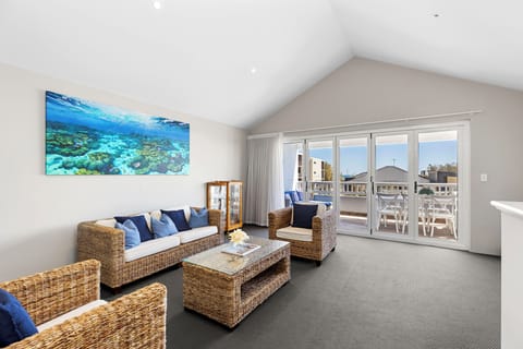 Bring the outside in! The glass doors open wide to create a seamless transition from the comfortable lounge to your private balcony.