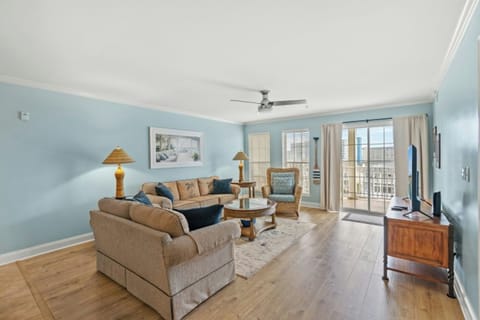 Let the sun shine in while you relax in this well furnished living room.
