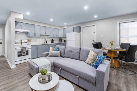 Open-concept space connecting living, dining and kitchen.