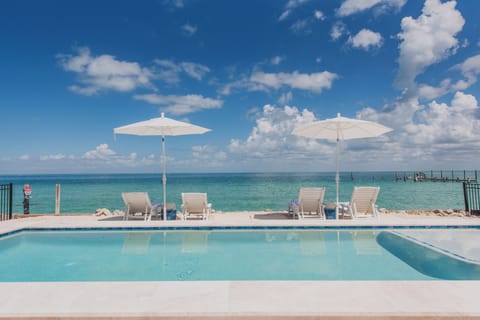 Your waterfront pool retreat awaits