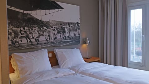 Stretch out and enjoy airy views from the window-side bed.
