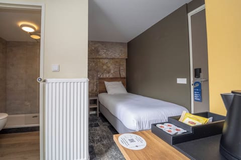 Drift off easily in a quiet single bed retreat.