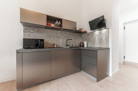 Condo, City View | Private kitchen | Fridge, microwave, stovetop, cookware/dishes/utensils