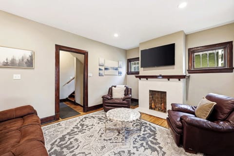 Living Area: Warm, inviting living space with comfortable seating.