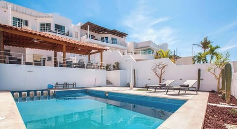 Lounge by the poolside and soak up the sun in a peaceful setting