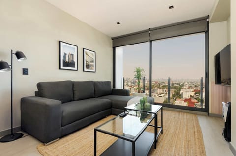 Bright living room with city views.

