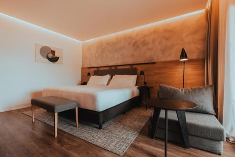 Relax under ambient lighting for a cozy, boutique feel.