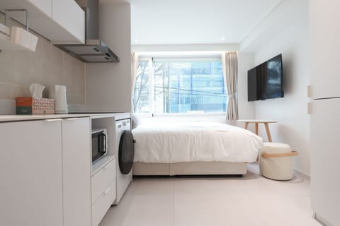 Standard Double Room, City View | Desk, blackout drapes, soundproofing, iron/ironing board