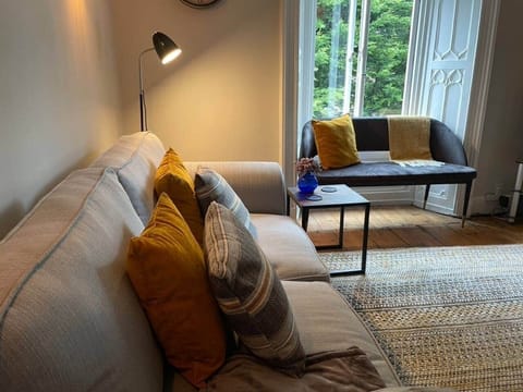 Living Room with lots of comfy space for relaxing at home after all day of exploring the local areas. 