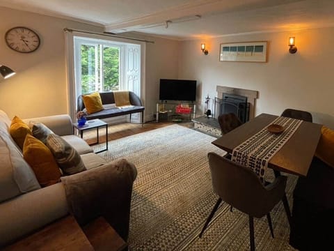Living Room with Dining Area and Fireplace