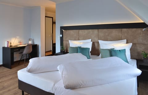 Comfort Double Room | Premium bedding, in-room safe, desk, soundproofing