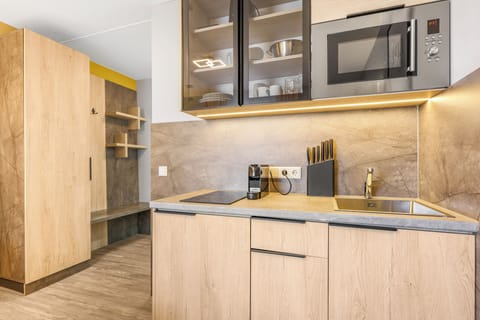 Exclusive Double Room, City View | Private kitchen | Fridge, espresso maker, coffee/tea maker, electric kettle
