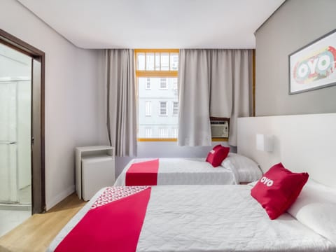 Twin Room | Minibar, desk, iron/ironing board, free WiFi