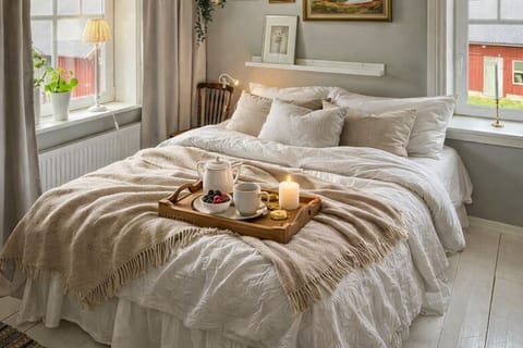 Bedroom with double bed, bunk bed, large dresser and a walk-in closet.