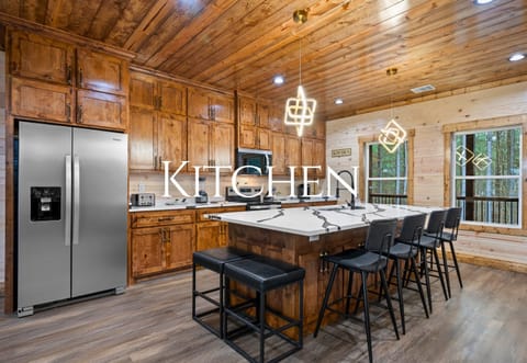 With plenty of counter space and modern appliances, the kitchen makes it easy to prepare meals for the whole group.