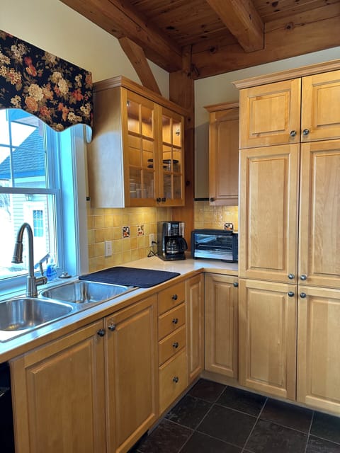 kitchen with toaster oven and drip coffee maker