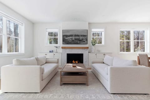 Curl up in the chic living room & stream your favorites on the smart TV​
