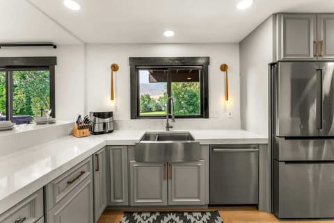 Kitchen 1: Bosch appliances, Keurig, air fryer, Crockpot, blender, toaster oven, tableware, main floor