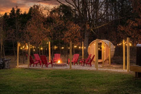 6-person barrel sauna next to the custom fire-pit 