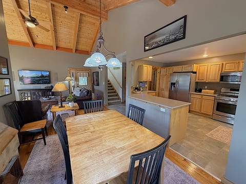 Fully Stocked Kitchen and Dining Area