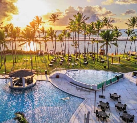 5 outdoor pools, open 9:00 AM to 10:00 PM, pool umbrellas, sun loungers
