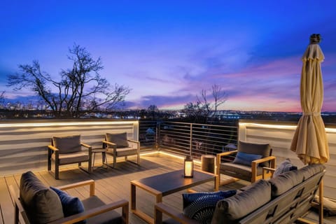 Skyline sunset views from the rooftop lounge create the perfect setting for unforgettable Nashville nights.